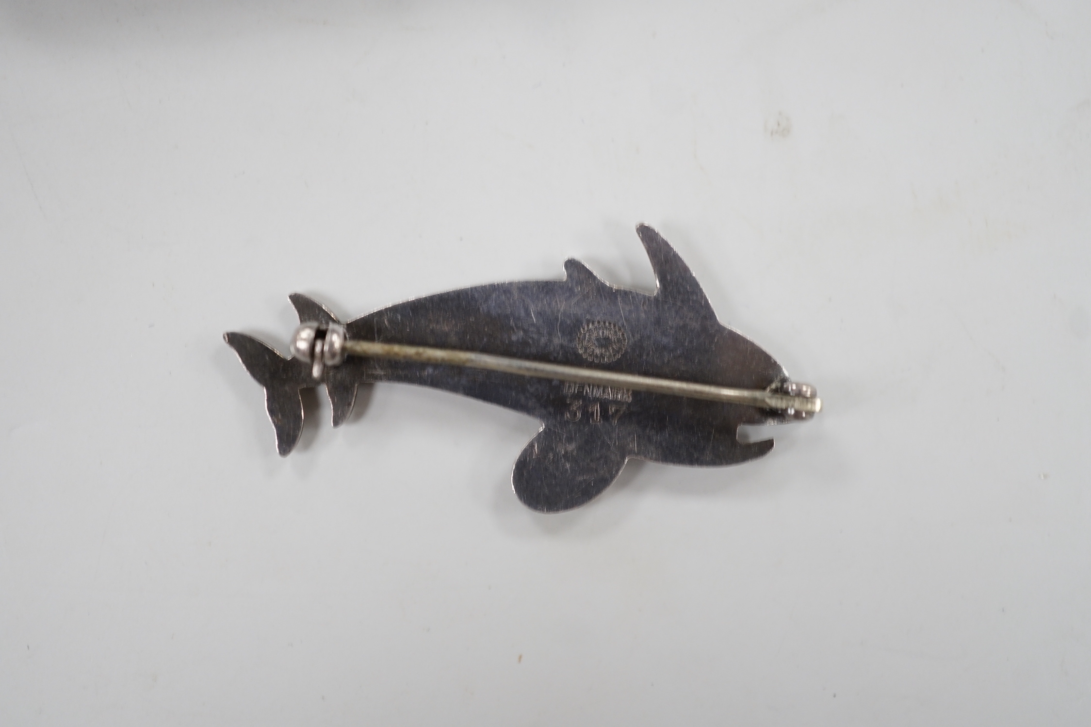 A Georg Jensen sterling twin dolphin brooch, design no. 317, 40mm.